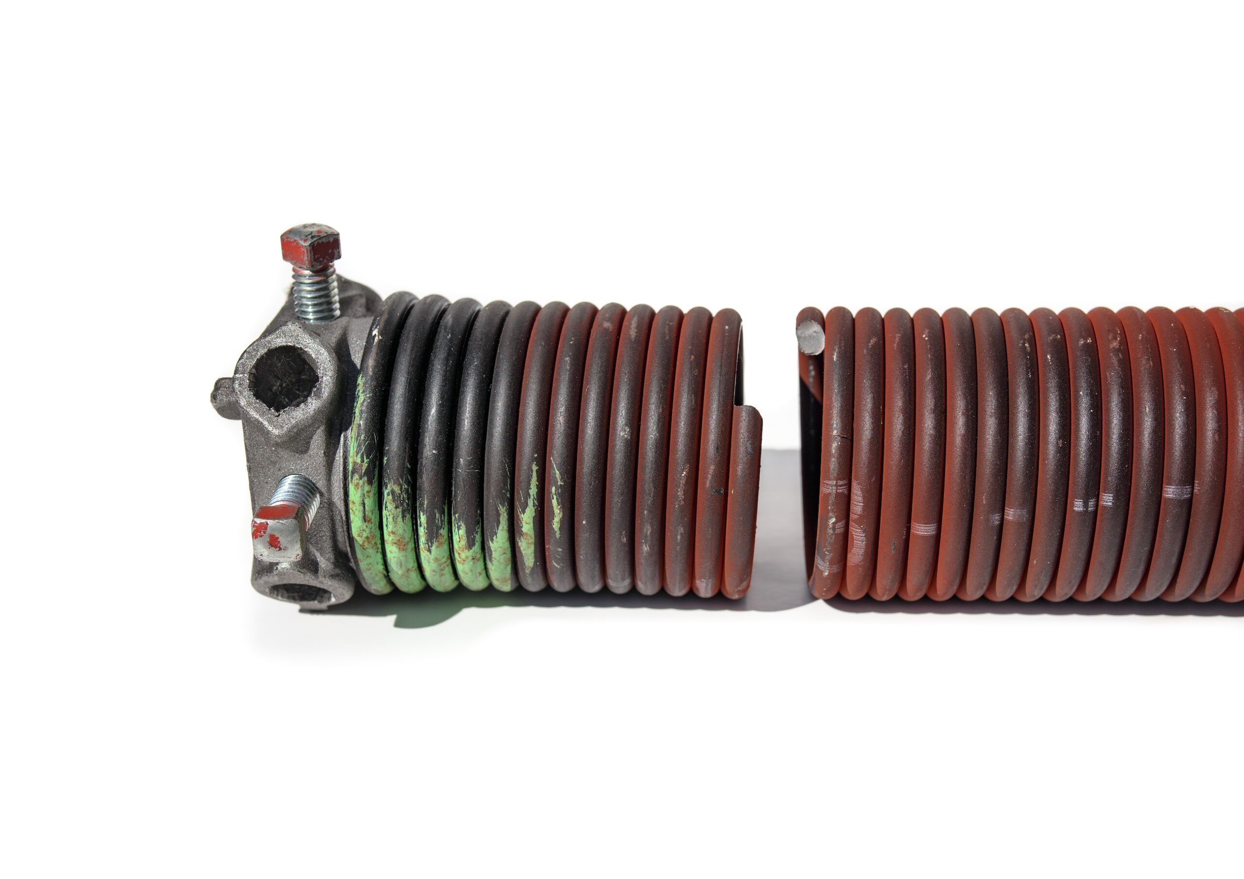 Image of broken spring on white background