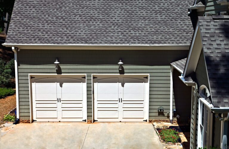 Attached garage on a house showing the doors.